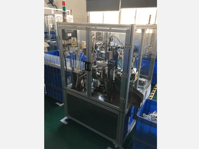 Drainage valve base automatic assembly machine